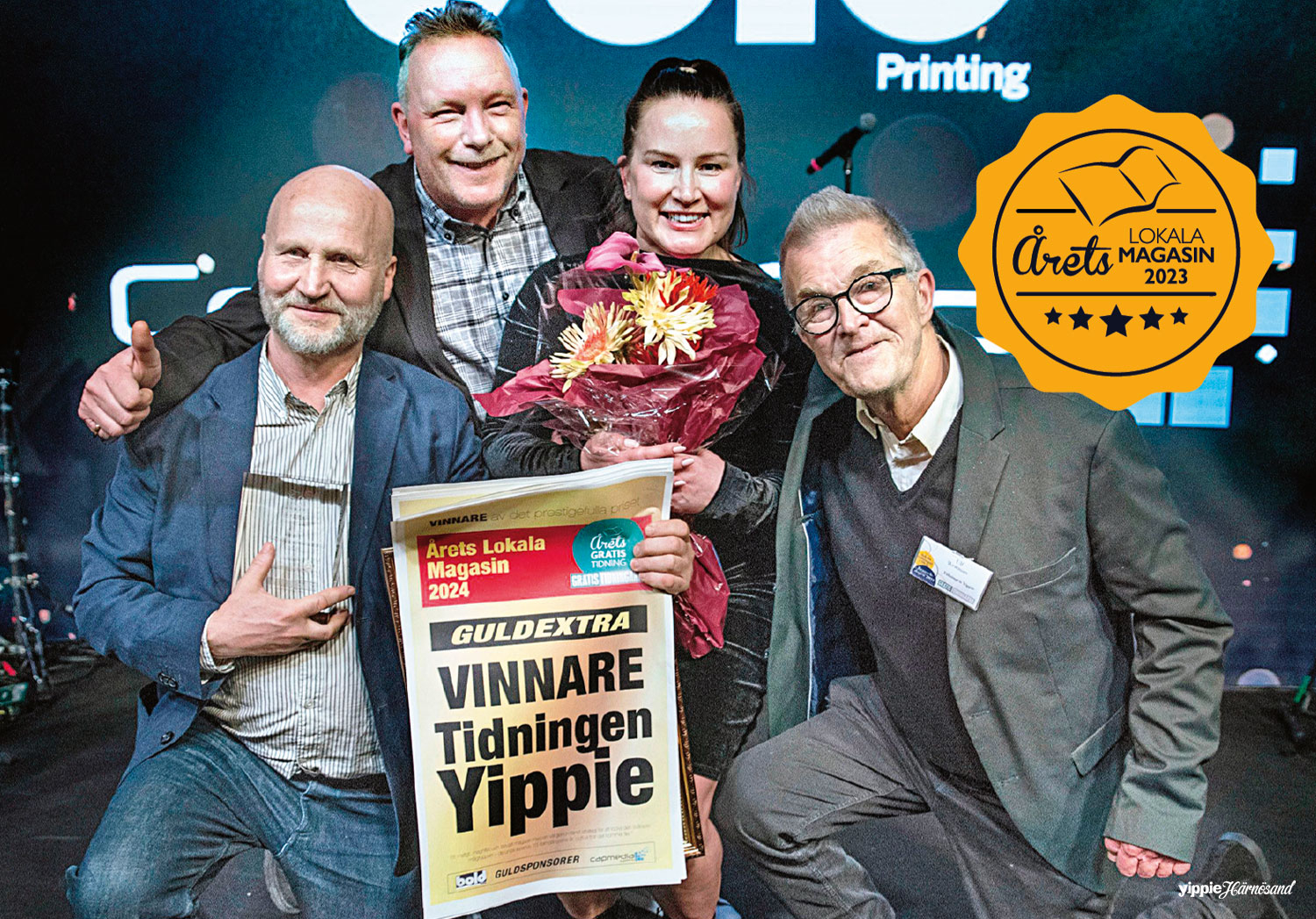 Kenneth Zetterlund, vd, projektledarna Stefan Fröberg och Linda Uhlander samt Ulf Westman, redaktör, tar emot priset som Årets lokala magasin i Stockholm.
